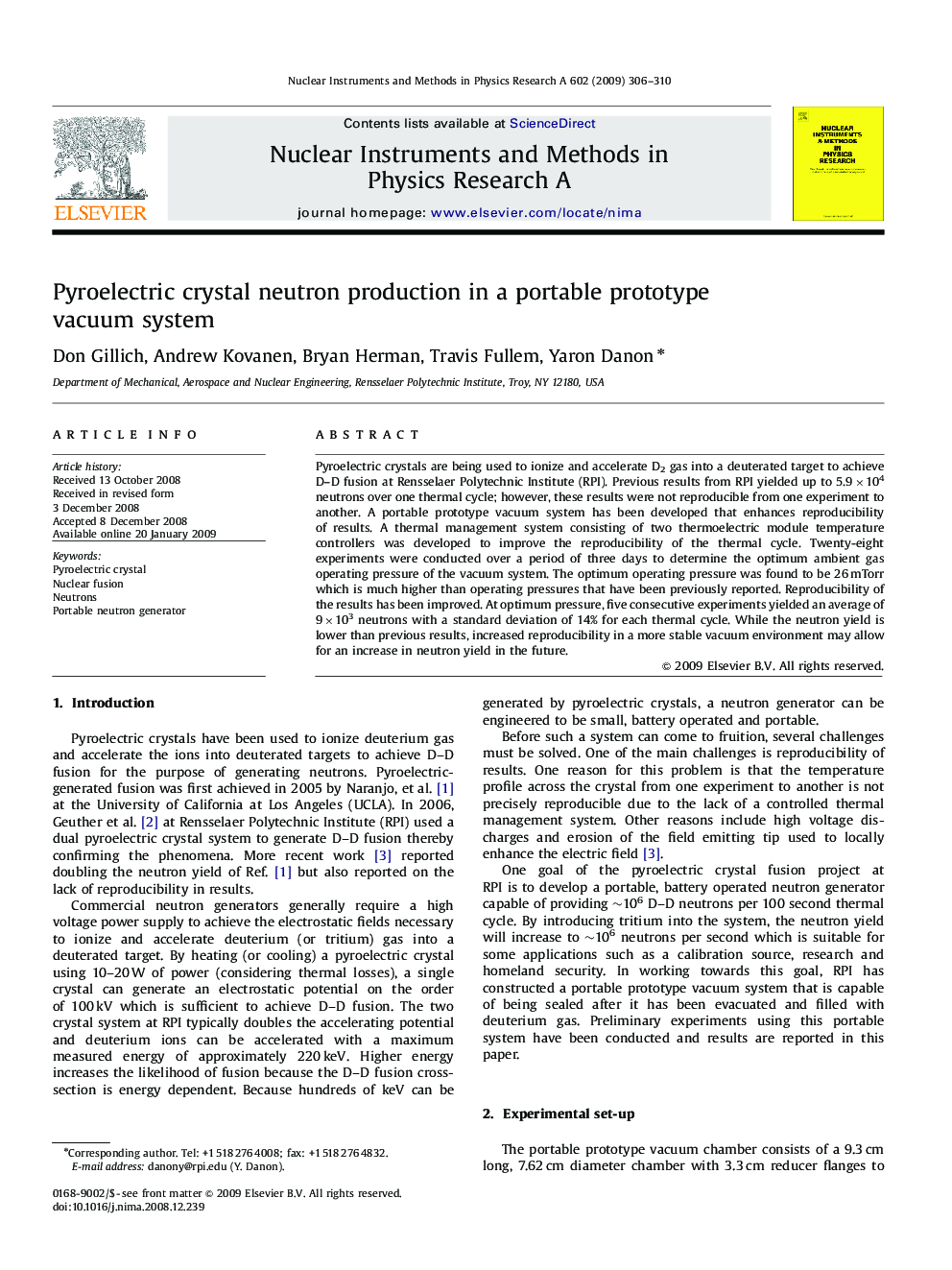 Pyroelectric crystal neutron production in a portable prototype vacuum system