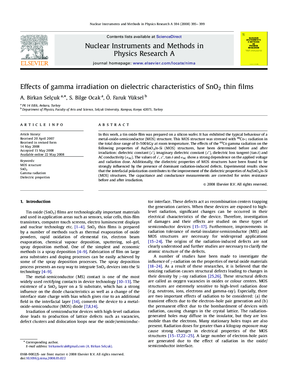 Effects of gamma irradiation on dielectric characteristics of SnO2 thin films