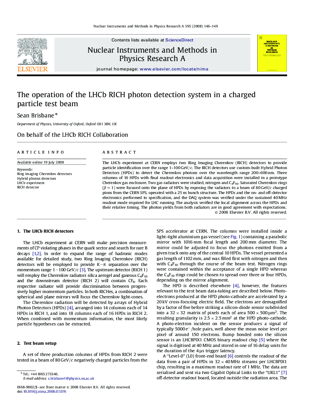 The operation of the LHCb RICH photon detection system in a charged particle test beam