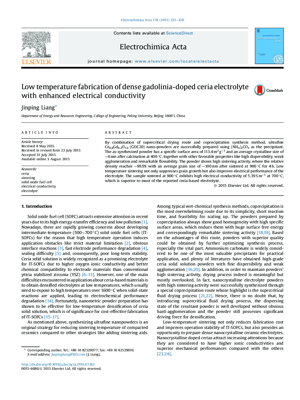 Low temperature fabrication of dense gadolinia-doped ceria electrolyte with enhanced electrical conductivity