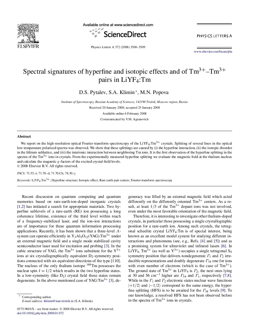 Spectral signatures of hyperfine and isotopic effects and of Tm3+–Tm3+ pairs in LiYF4:Tm