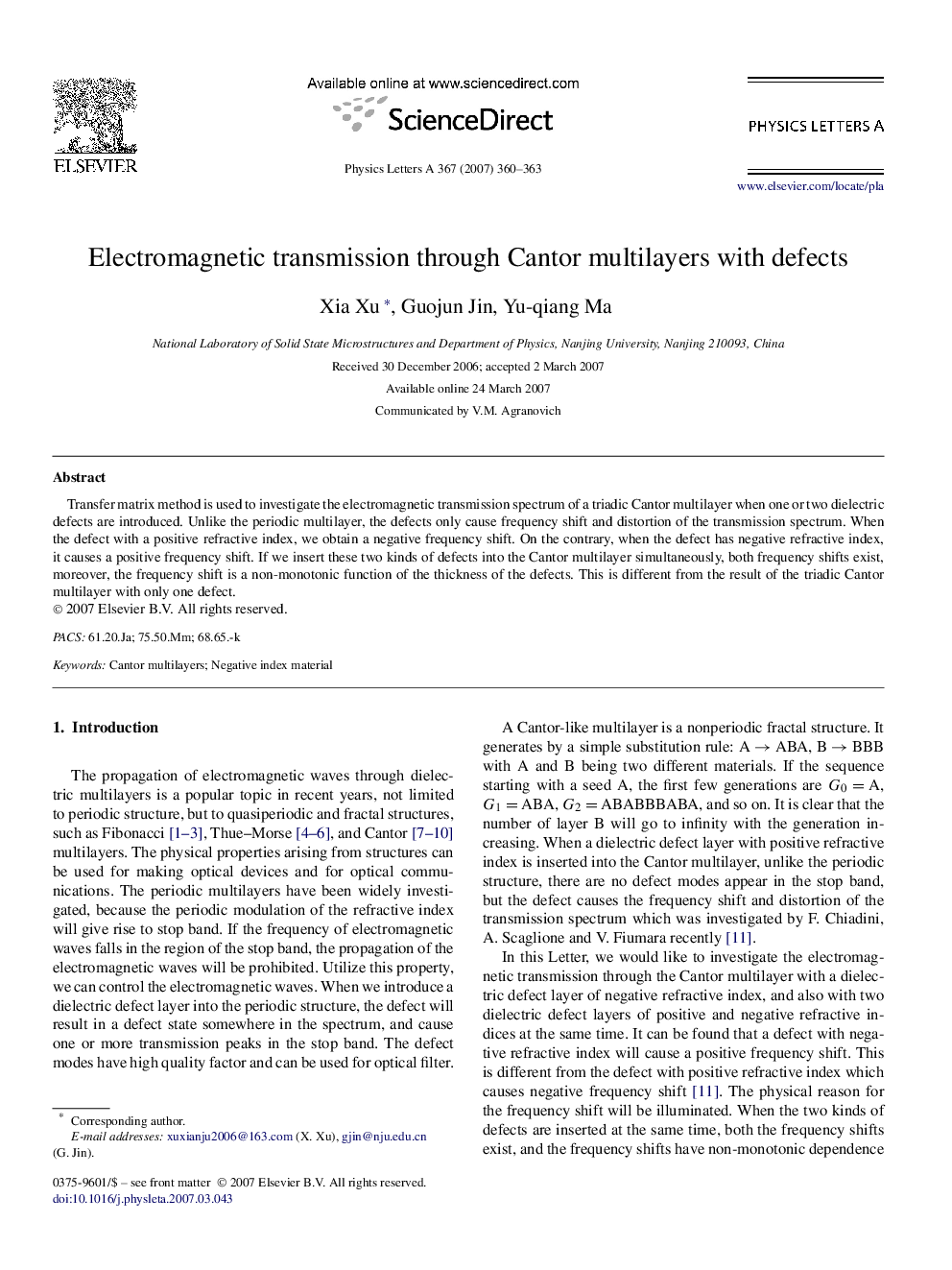 Electromagnetic transmission through Cantor multilayers with defects