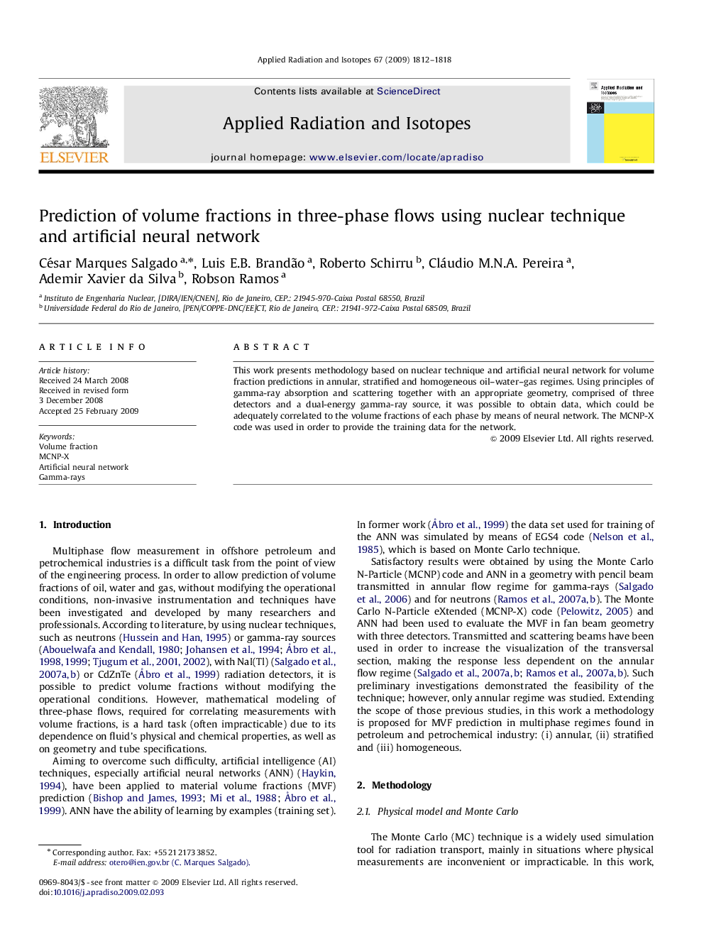 Prediction of volume fractions in three-phase flows using nuclear technique and artificial neural network