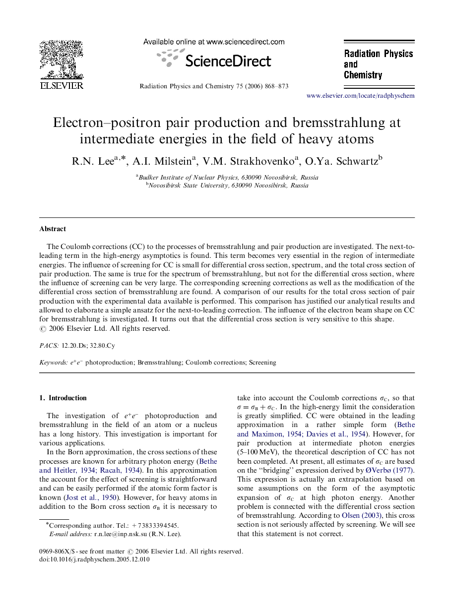 Electron–positron pair production and bremsstrahlung at intermediate energies in the field of heavy atoms