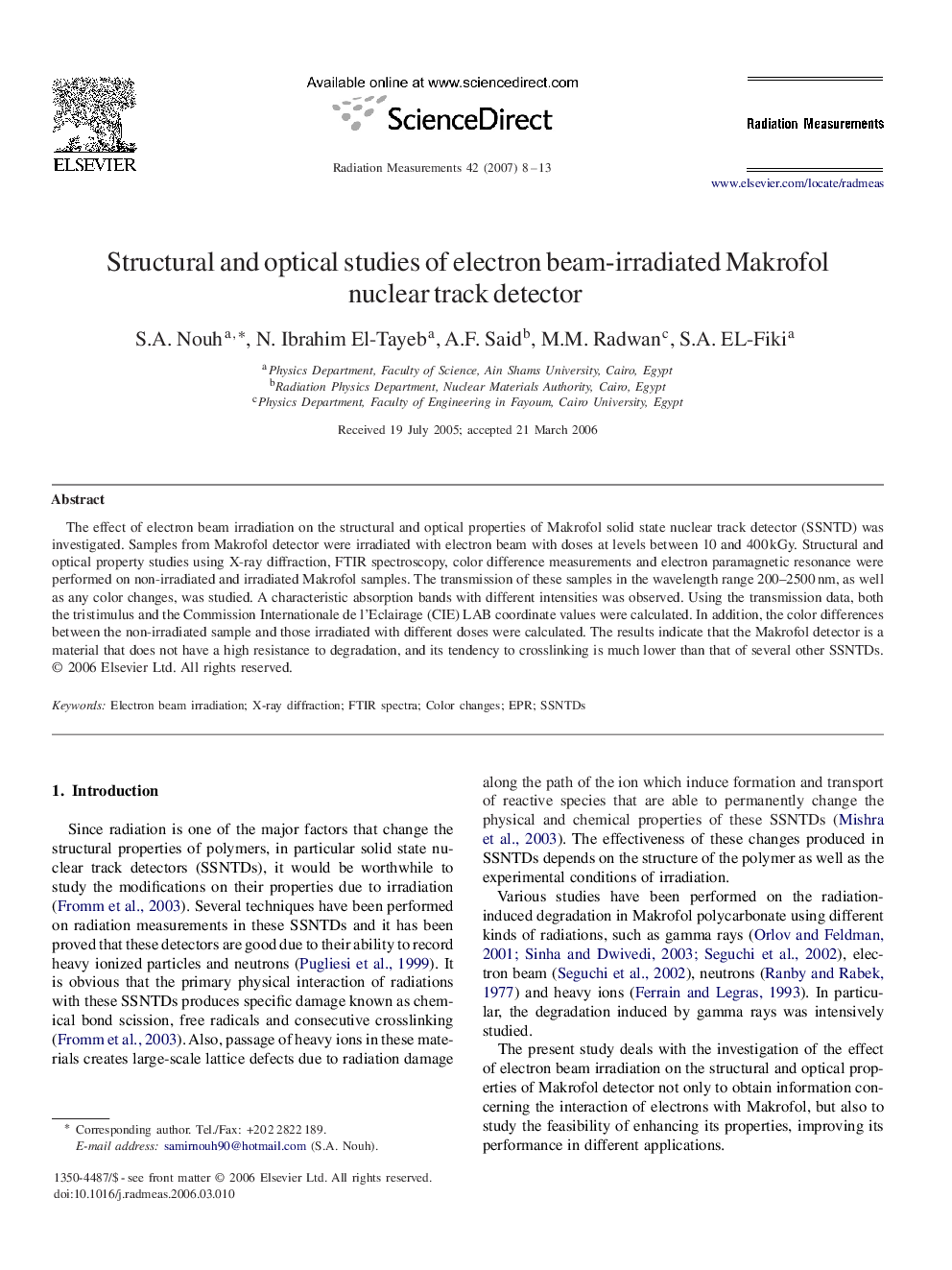 Structural and optical studies of electron beam-irradiated Makrofol nuclear track detector