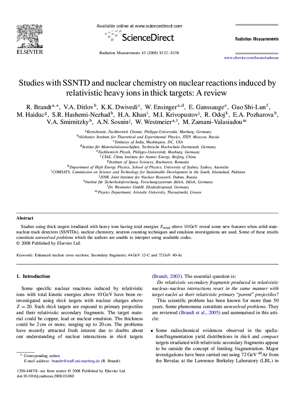 Studies with SSNTD and nuclear chemistry on nuclear reactions induced by relativistic heavy ions in thick targets: A review