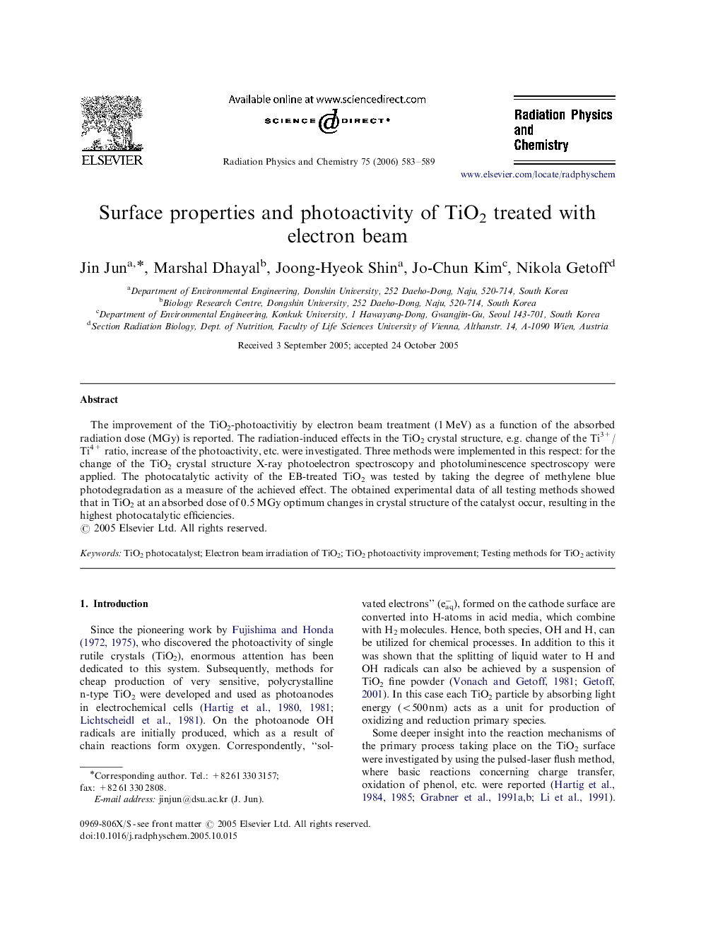 Surface properties and photoactivity of TiO2 treated with electron beam