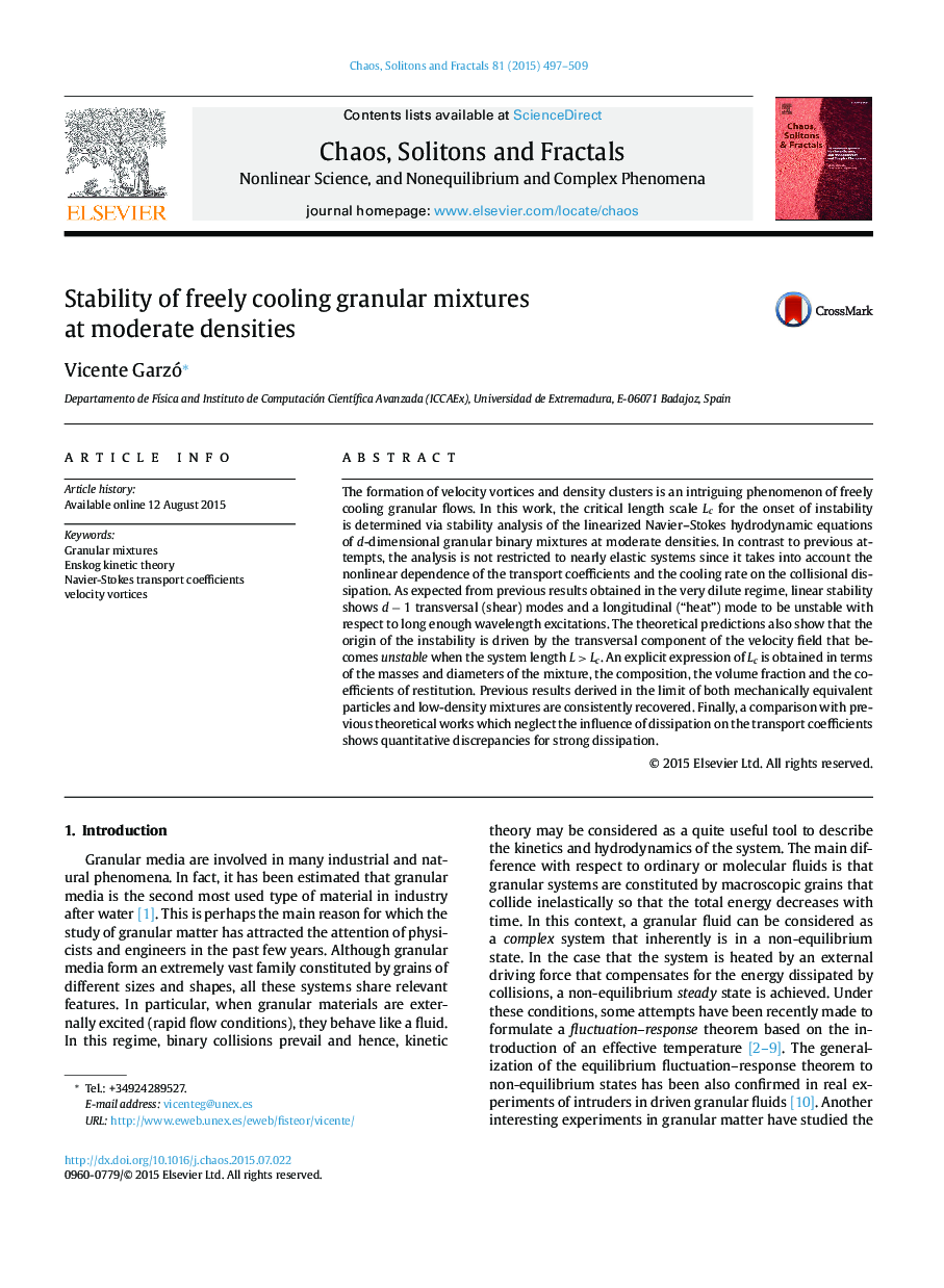 Stability of freely cooling granular mixtures at moderate densities