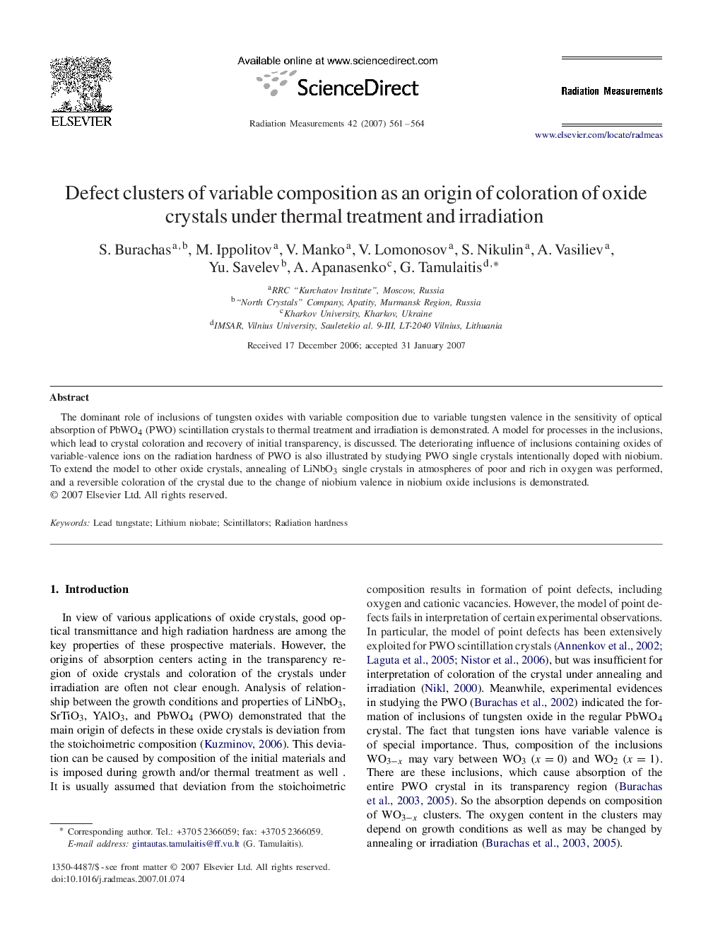 Defect clusters of variable composition as an origin of coloration of oxide crystals under thermal treatment and irradiation