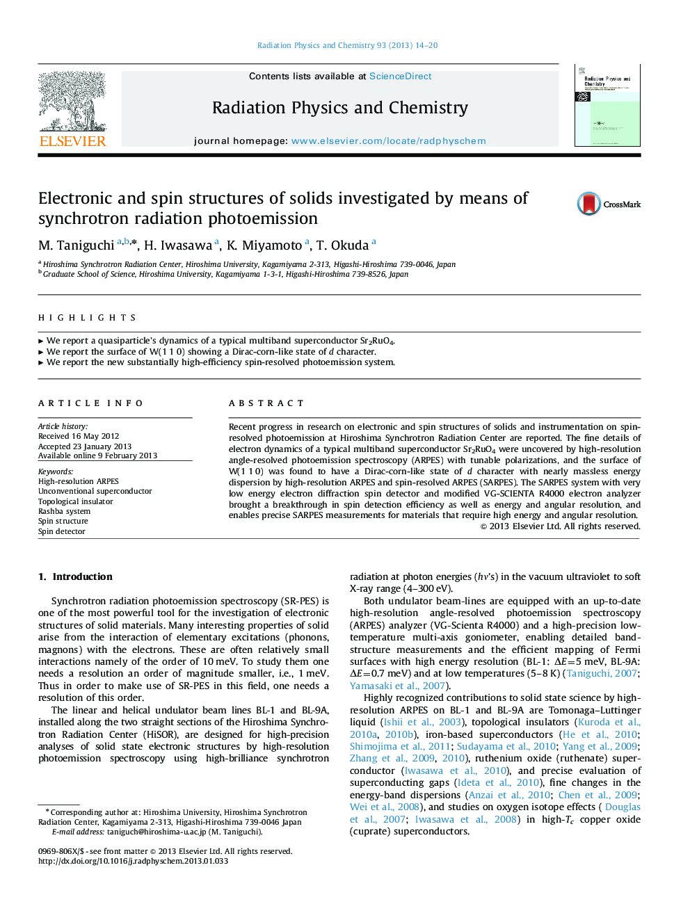 Electronic and spin structures of solids investigated by means of synchrotron radiation photoemission