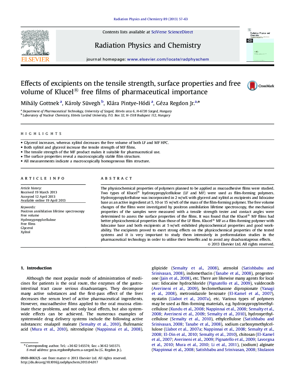 Effects of excipients on the tensile strength, surface properties and free volume of Klucel® free films of pharmaceutical importance