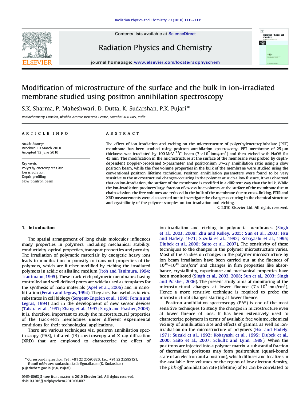 Modification of microstructure of the surface and the bulk in ion-irradiated membrane studied using positron annihilation spectroscopy