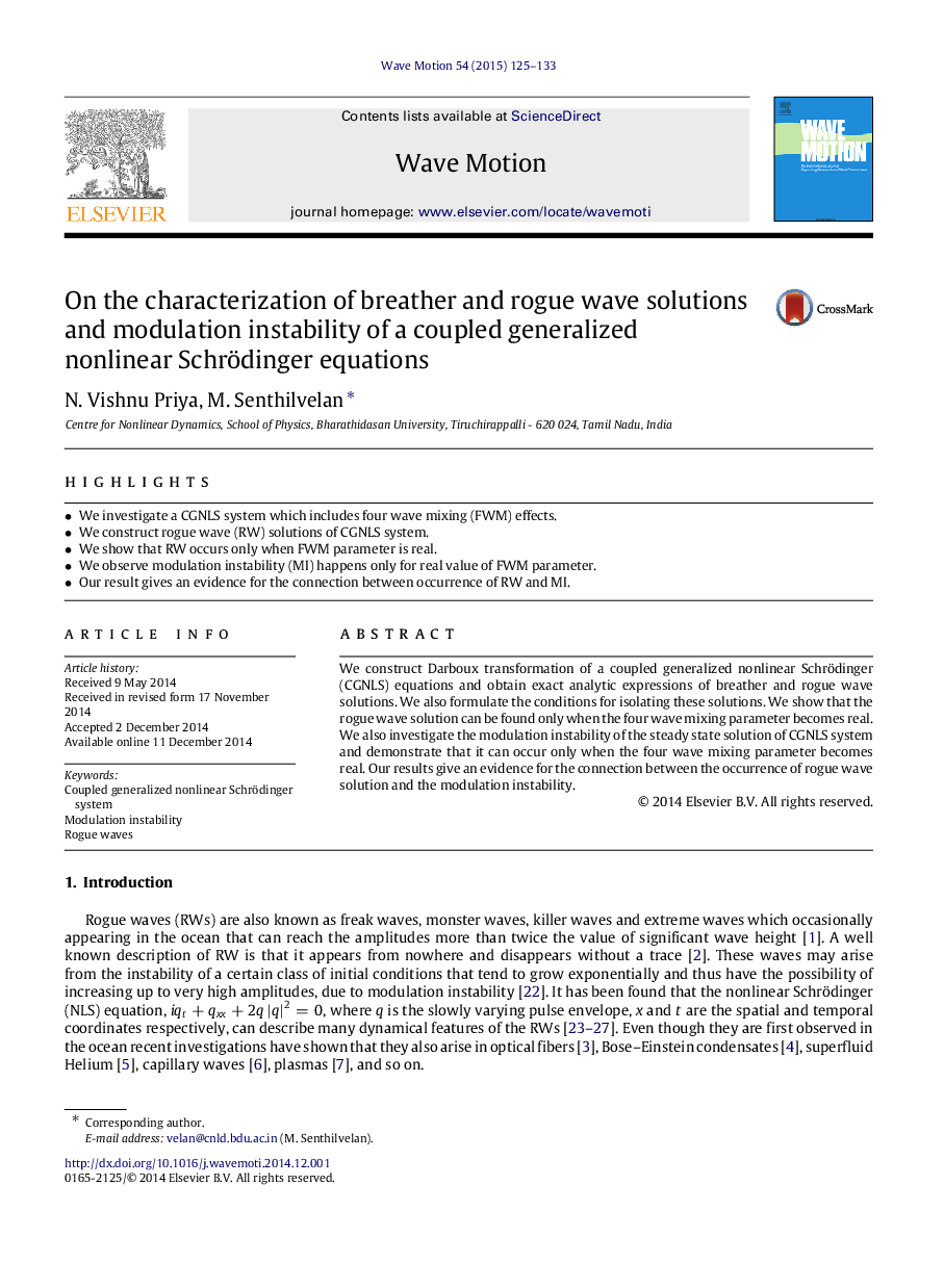 On the characterization of breather and rogue wave solutions and modulation instability of a coupled generalized nonlinear Schrödinger equations