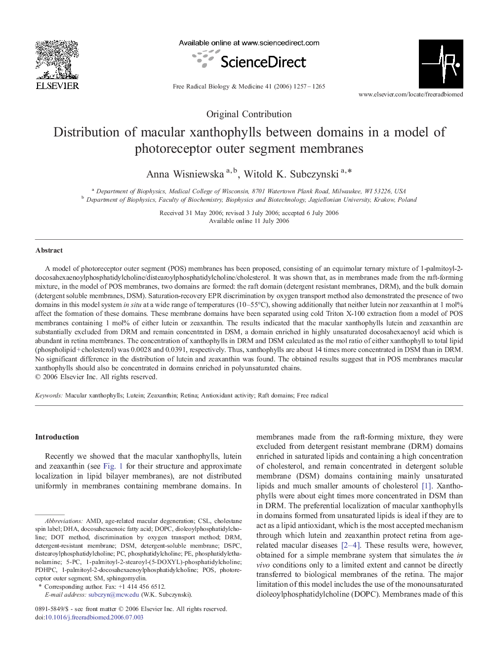 Distribution of macular xanthophylls between domains in a model of photoreceptor outer segment membranes