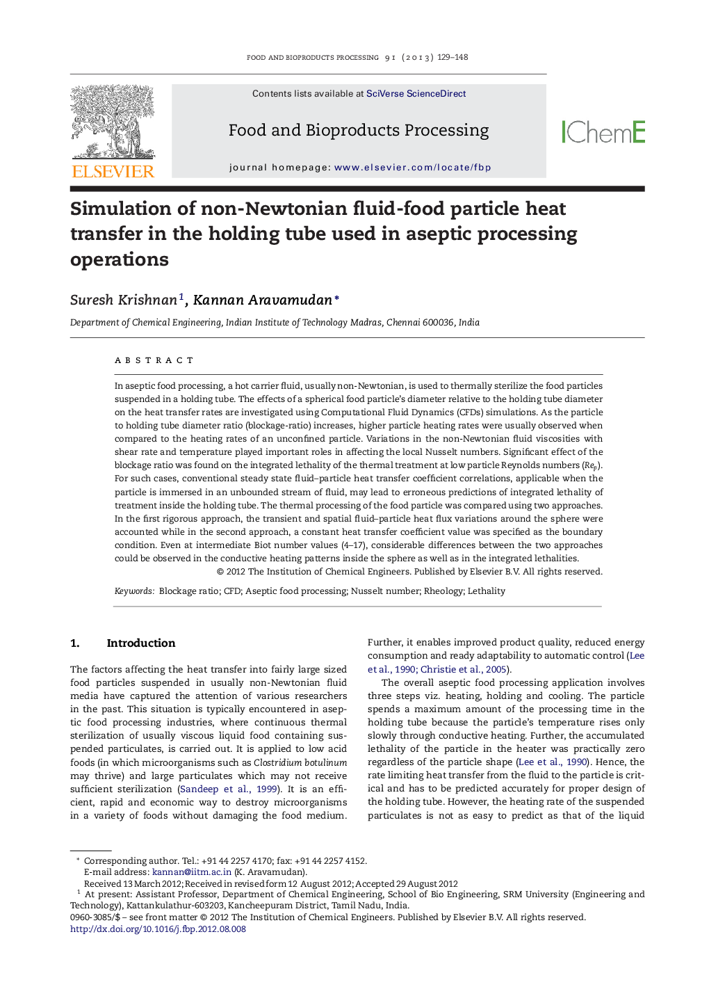 Simulation of non-Newtonian fluid-food particle heat transfer in the holding tube used in aseptic processing operations