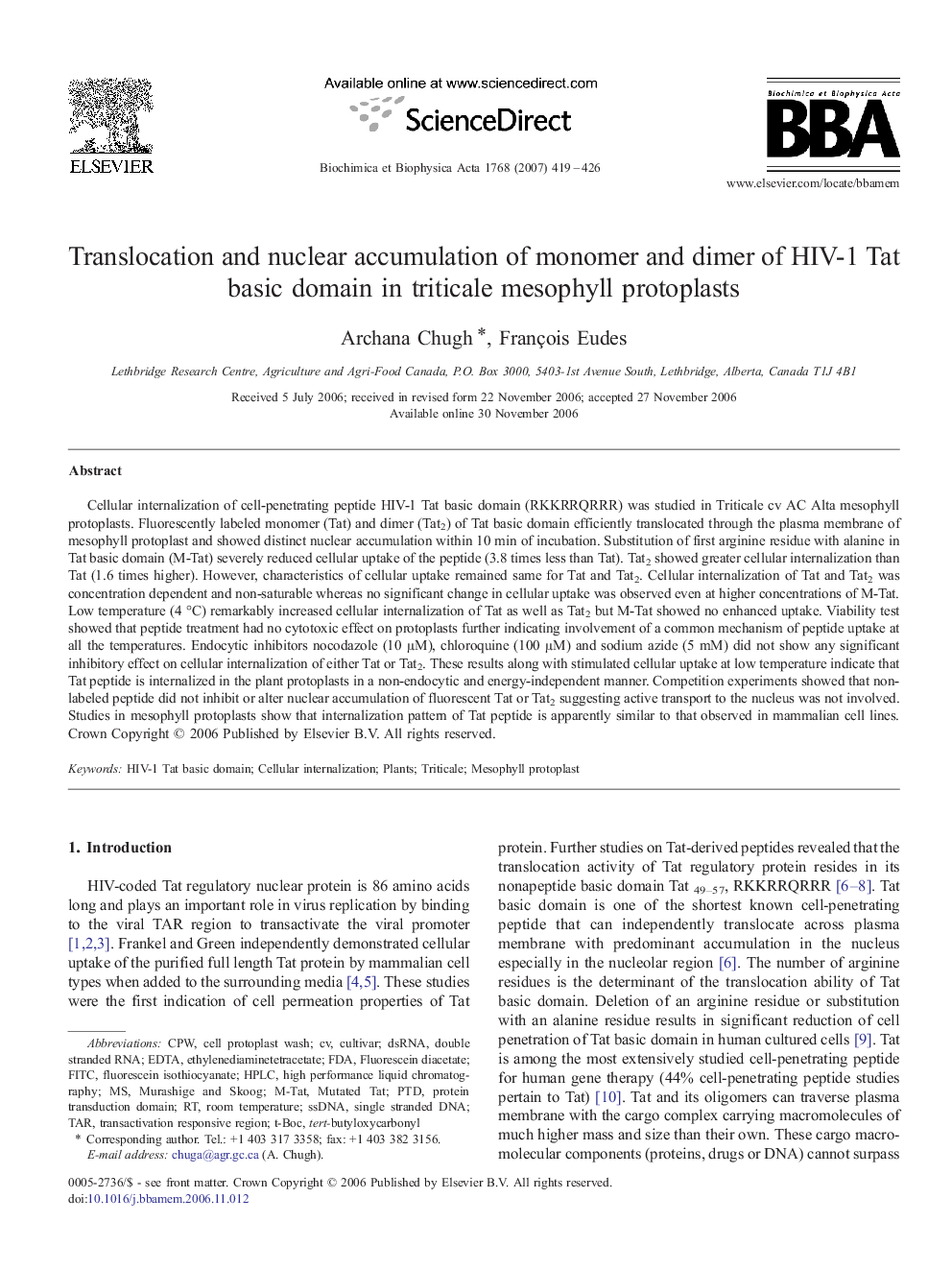 Translocation and nuclear accumulation of monomer and dimer of HIV-1 Tat basic domain in triticale mesophyll protoplasts