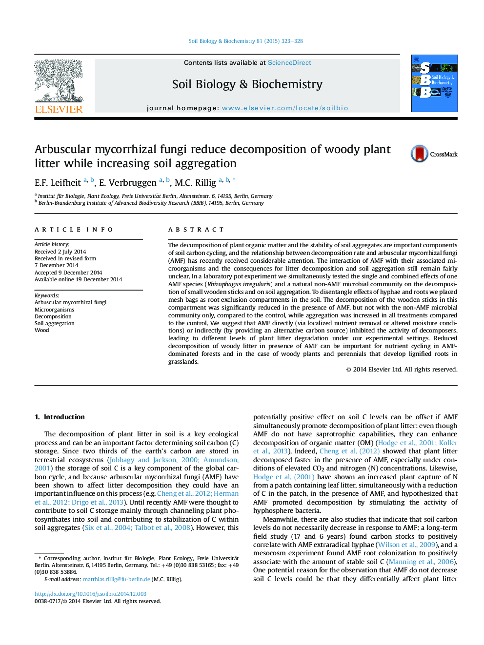 Arbuscular mycorrhizal fungi reduce decomposition of woody plant litter while increasing soil aggregation