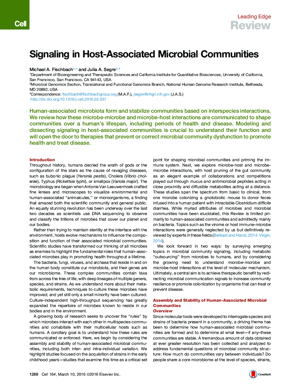 Signaling in Host-Associated Microbial Communities