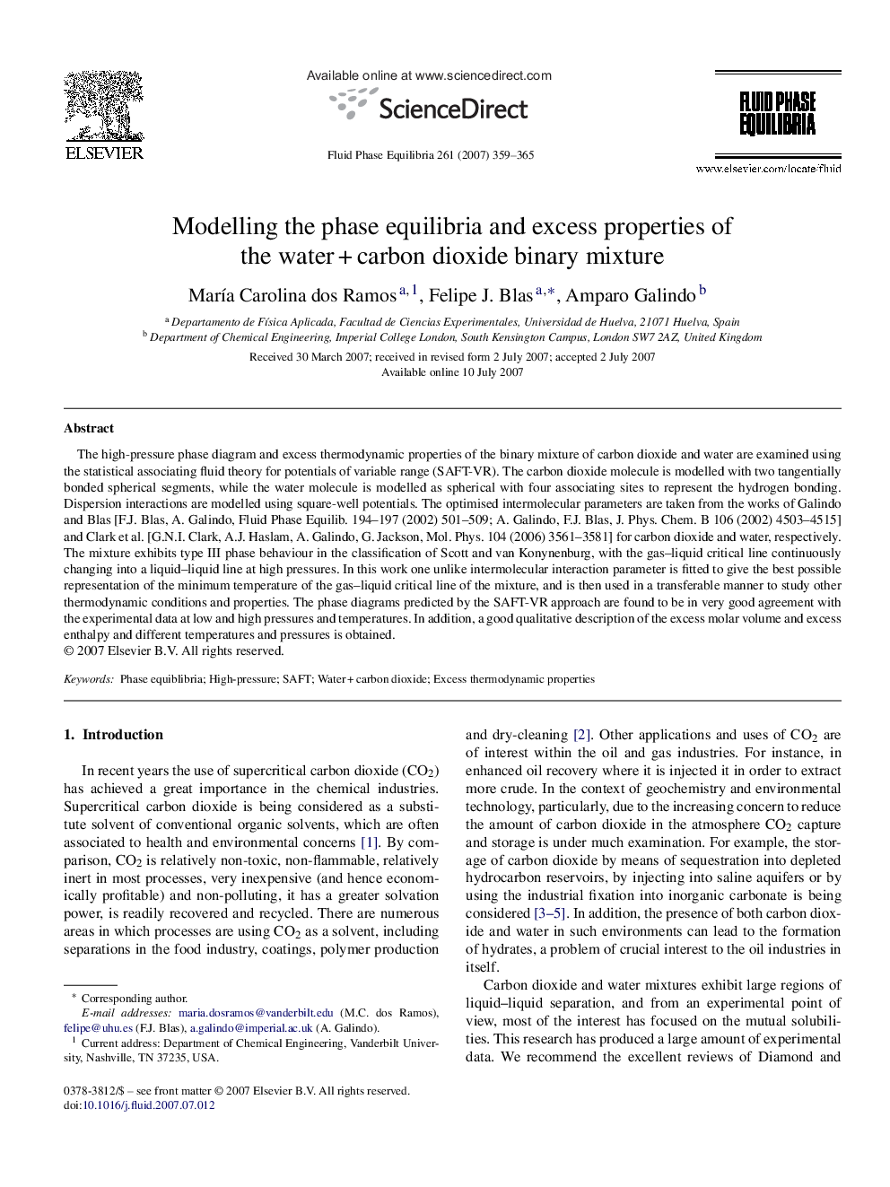 Modelling the phase equilibria and excess properties of the water + carbon dioxide binary mixture