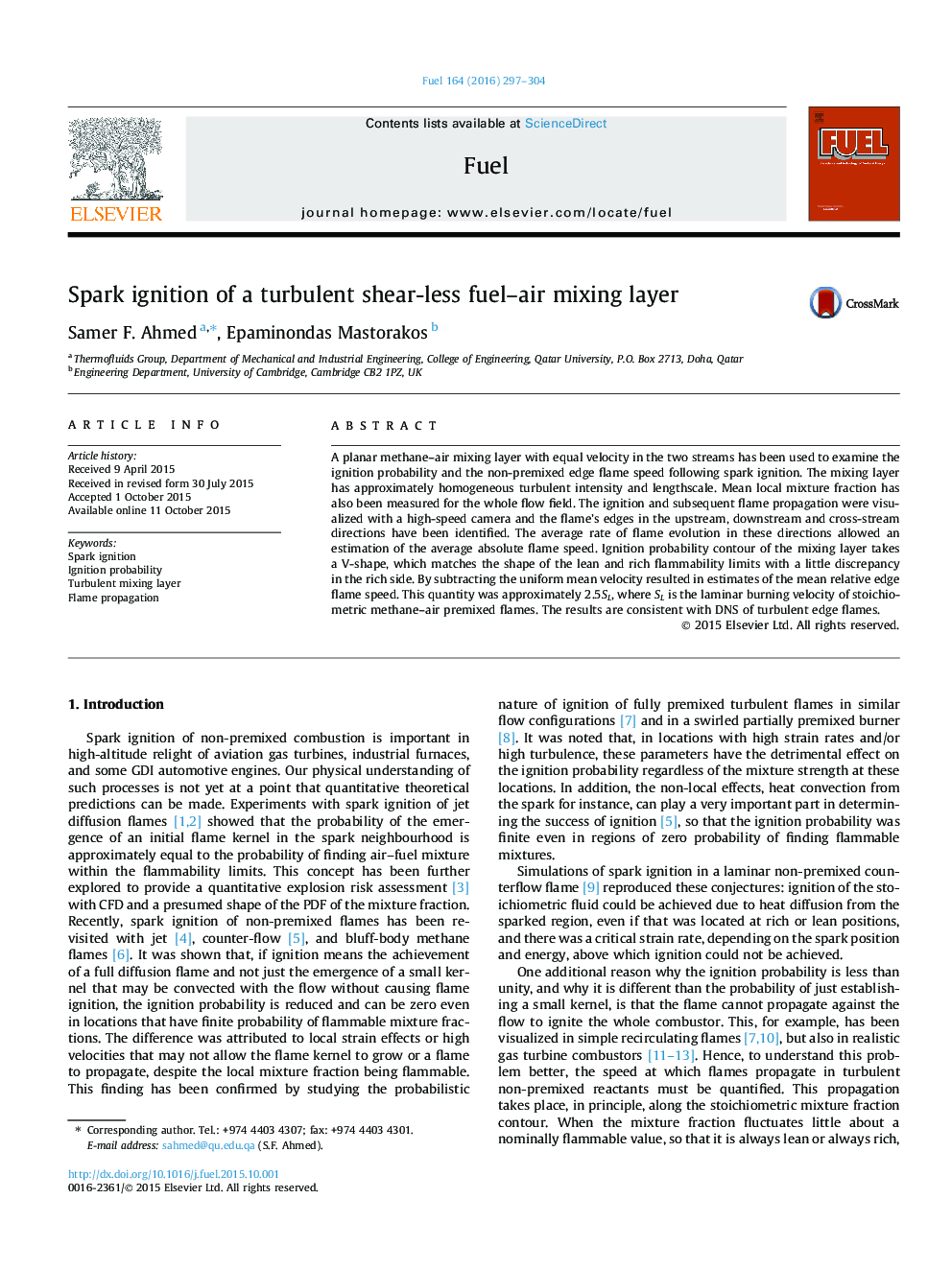 Spark ignition of a turbulent shear-less fuel–air mixing layer