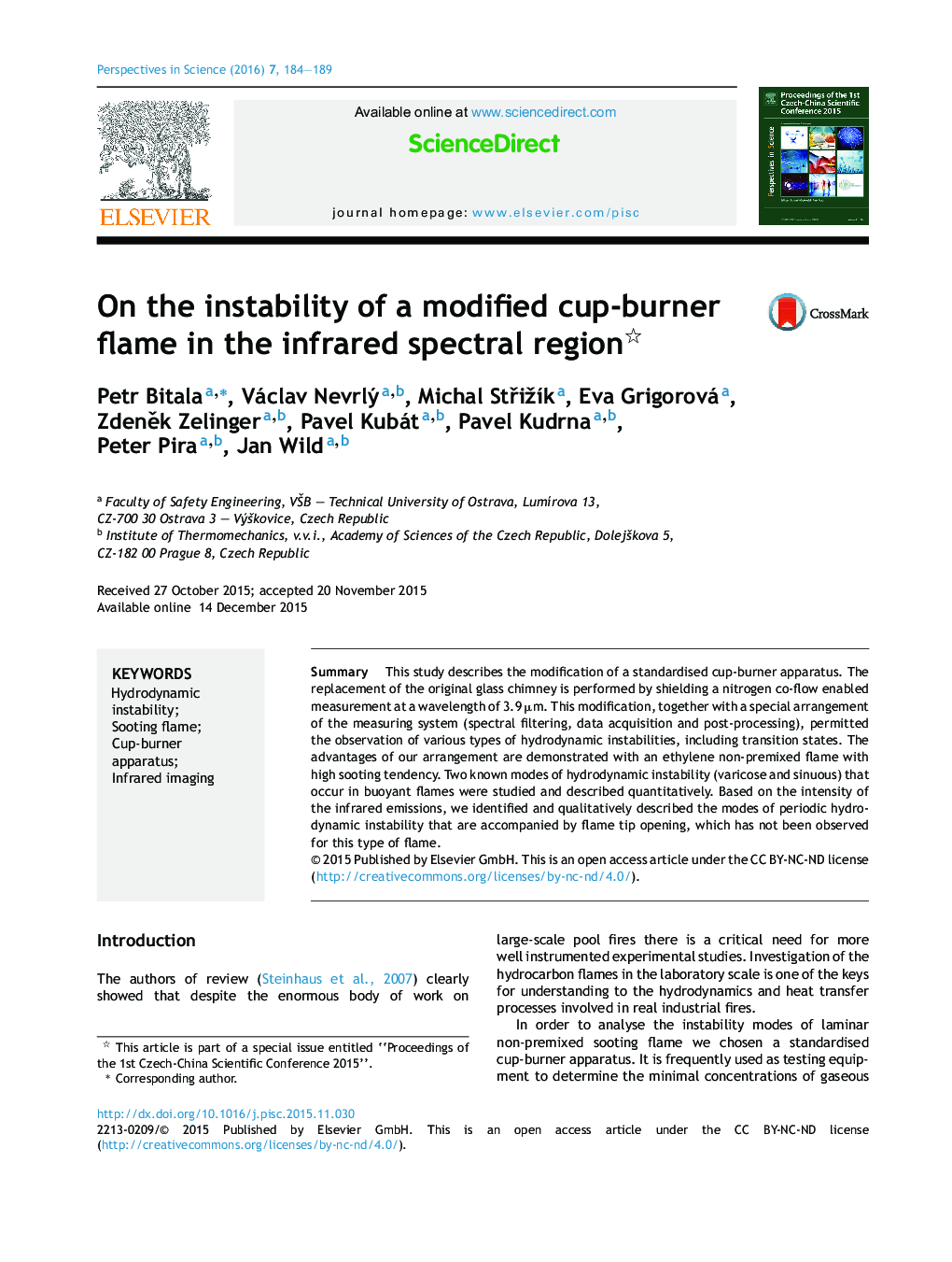 On the instability of a modified cup-burner flame in the infrared spectral region 