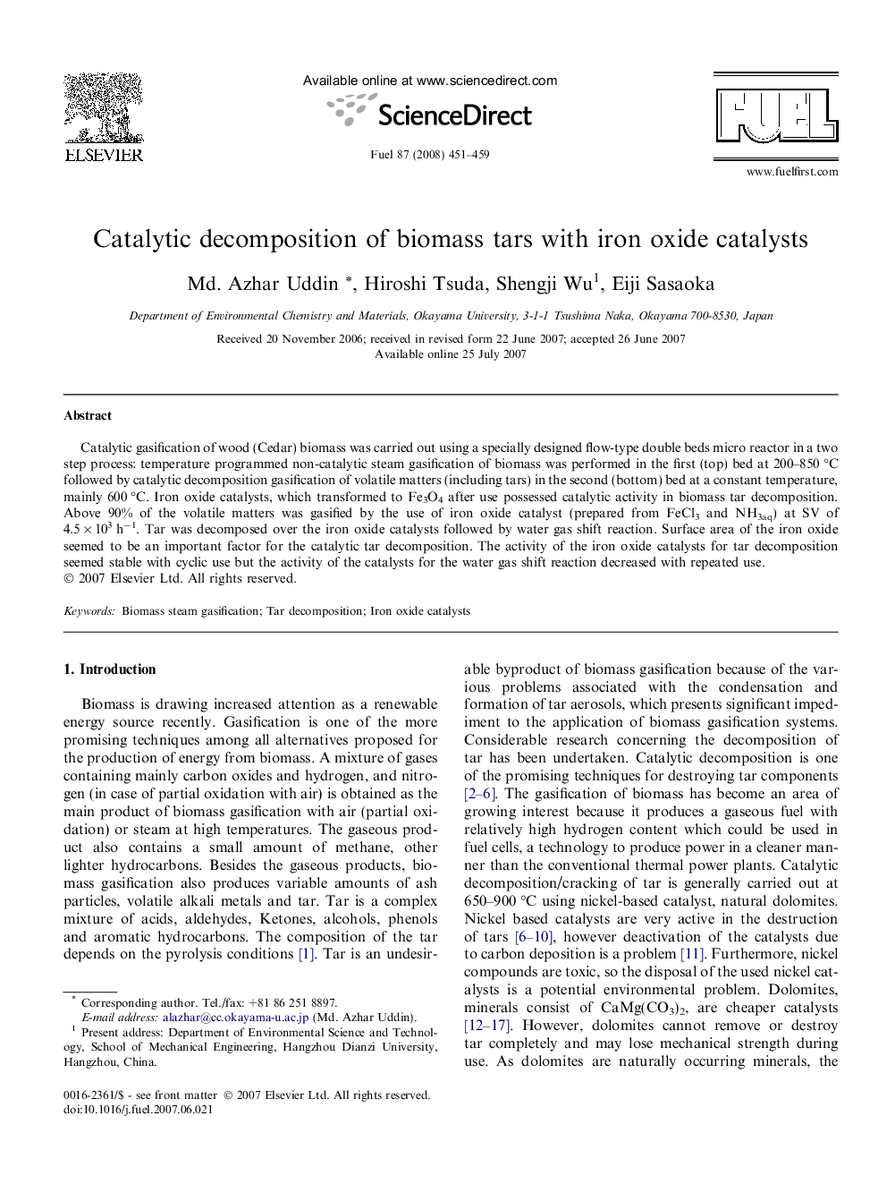 Catalytic decomposition of biomass tars with iron oxide catalysts