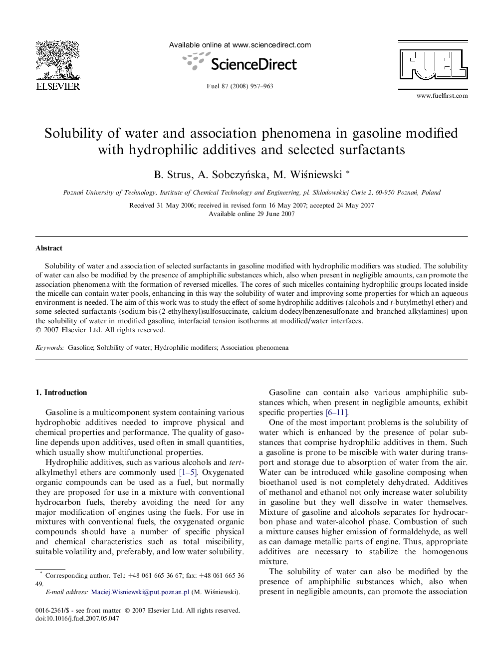 Solubility of water and association phenomena in gasoline modified with hydrophilic additives and selected surfactants