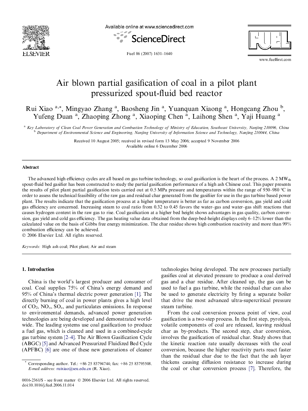 Air blown partial gasification of coal in a pilot plant pressurized spout-fluid bed reactor