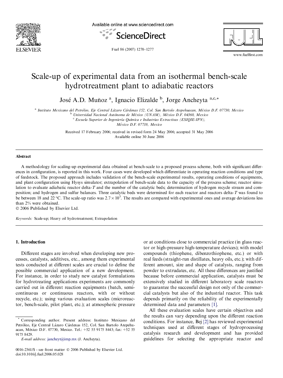 Scale-up of experimental data from an isothermal bench-scale hydrotreatment plant to adiabatic reactors