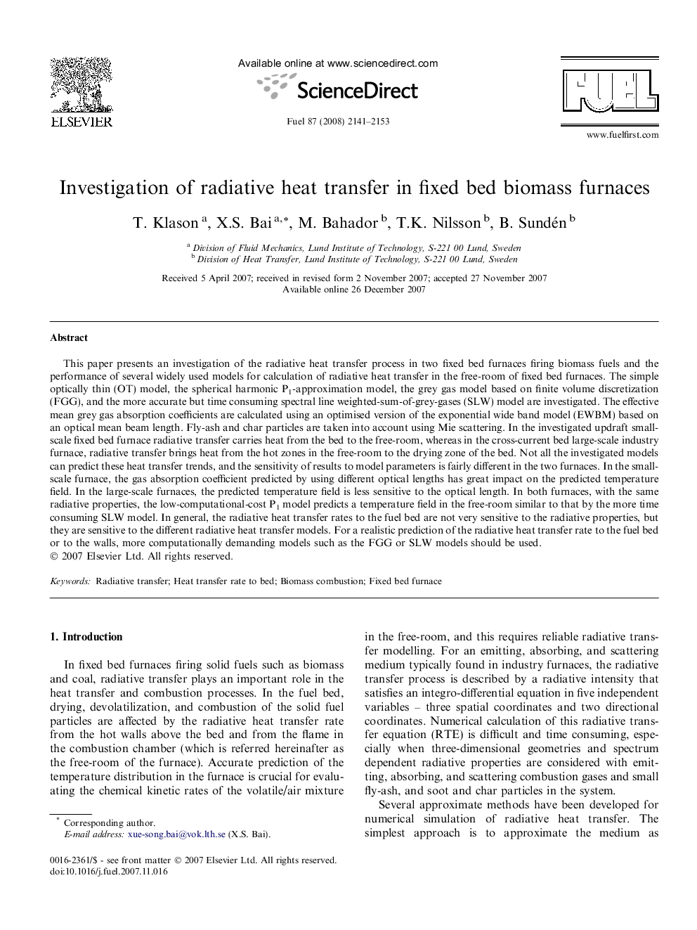 Investigation of radiative heat transfer in fixed bed biomass furnaces