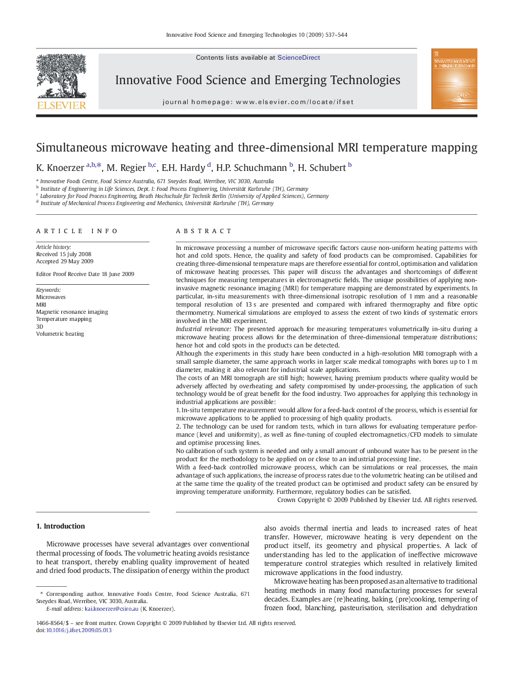 Simultaneous microwave heating and three-dimensional MRI temperature mapping