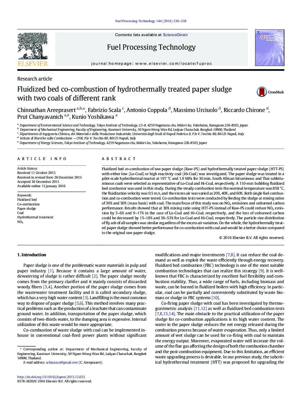 Fluidized bed co-combustion of hydrothermally treated paper sludge with two coals of different rank