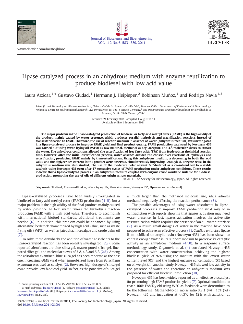 Lipase-catalyzed process in an anhydrous medium with enzyme reutilization to produce biodiesel with low acid value