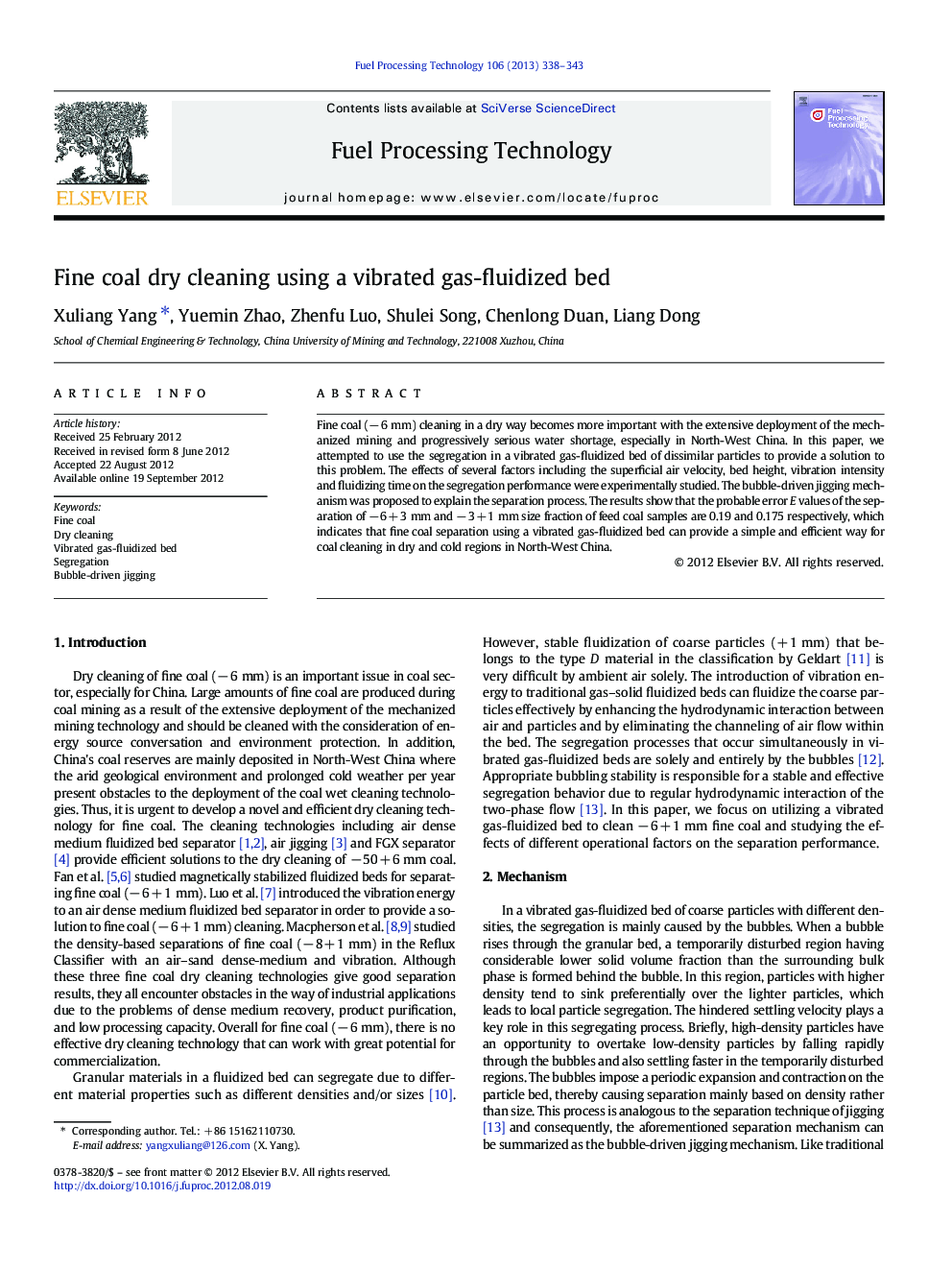 Fine coal dry cleaning using a vibrated gas-fluidized bed