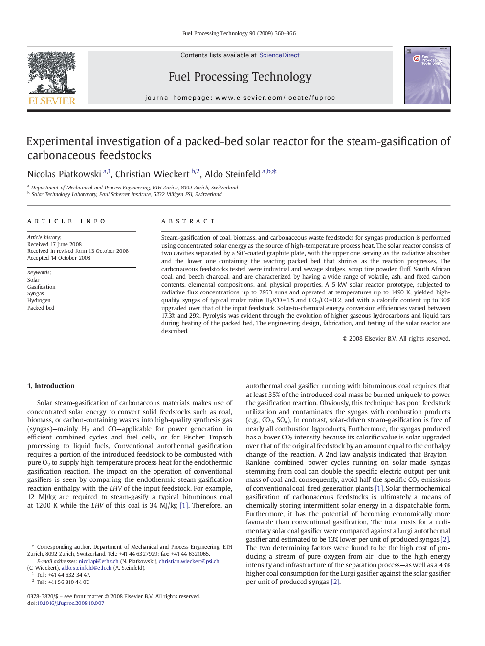 Experimental investigation of a packed-bed solar reactor for the steam-gasification of carbonaceous feedstocks