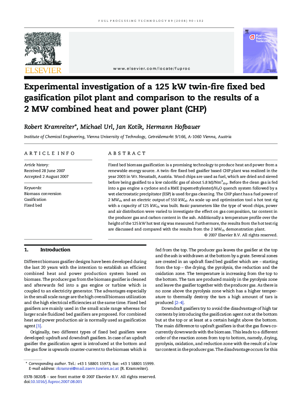 Experimental investigation of a 125 kW twin-fire fixed bed gasification pilot plant and comparison to the results of a 2 MW combined heat and power plant (CHP)