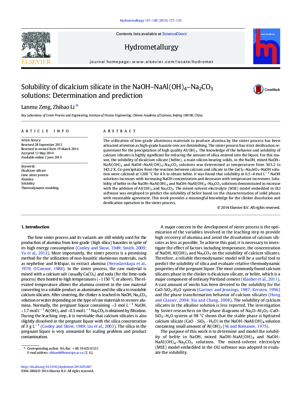 Solubility of dicalcium silicate in the NaOH–NaAl(OH)4–Na2CO3 solutions: Determination and prediction