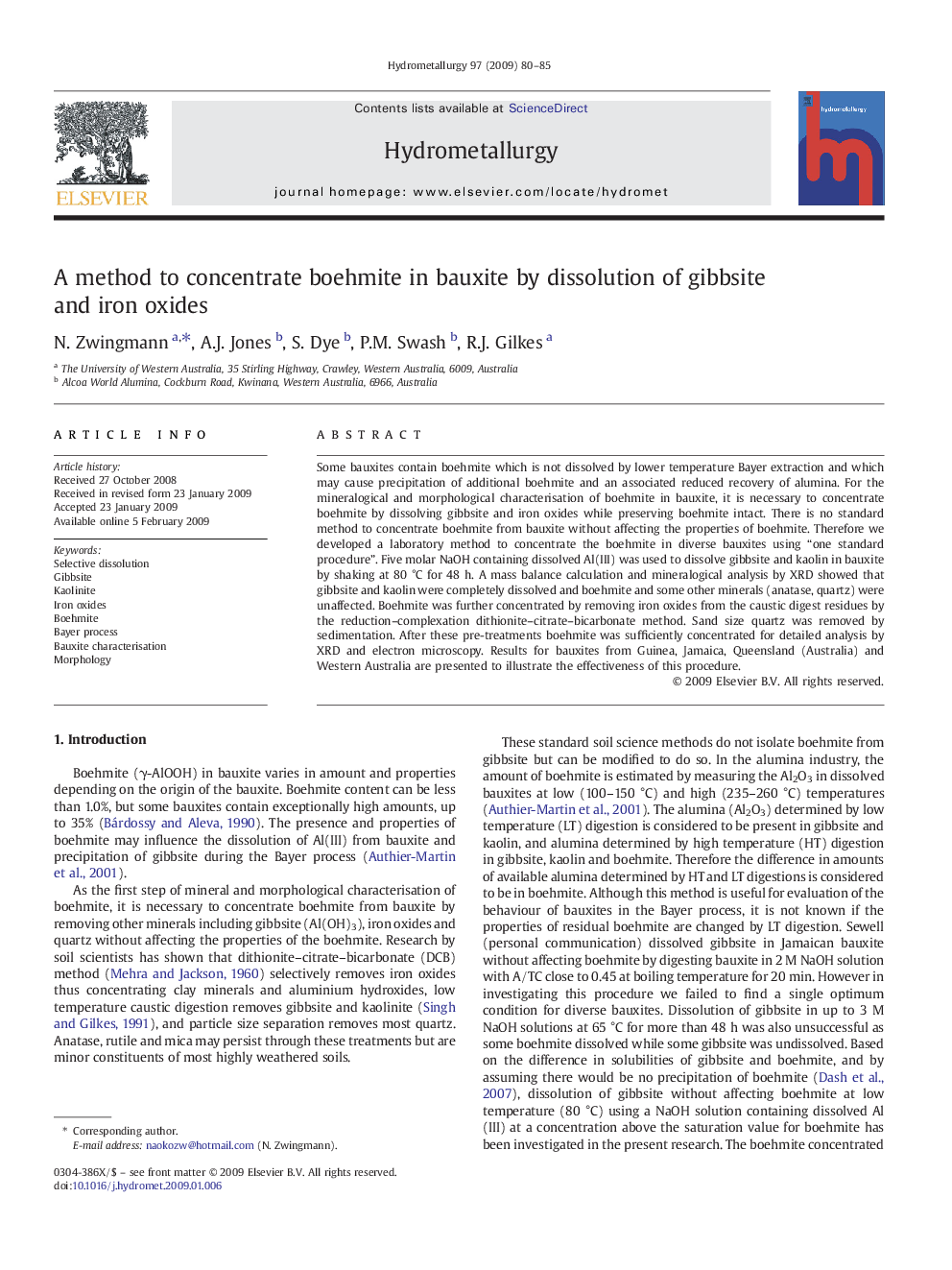 A method to concentrate boehmite in bauxite by dissolution of gibbsite and iron oxides