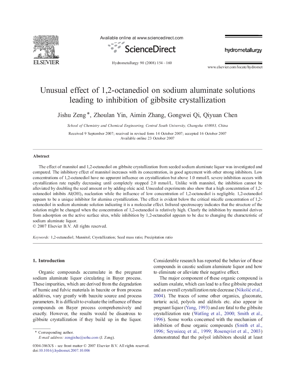 Unusual effect of 1,2-octanediol on sodium aluminate solutions leading to inhibition of gibbsite crystallization