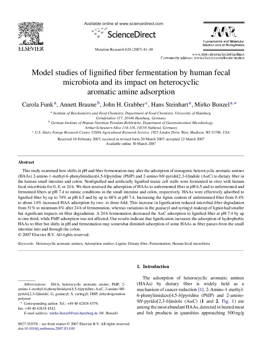 Model studies of lignified fiber fermentation by human fecal microbiota and its impact on heterocyclic aromatic amine adsorption