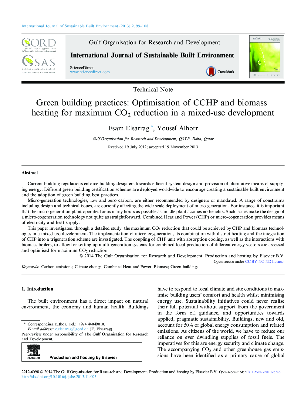 Green building practices: Optimisation of CCHP and biomass heating for maximum CO2 reduction in a mixed-use development 