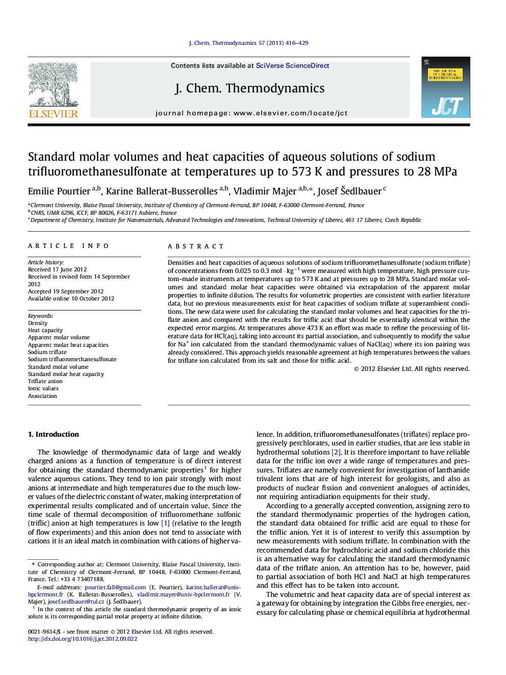 Standard molar volumes and heat capacities of aqueous solutions of sodium trifluoromethanesulfonate at temperatures up to 573 K and pressures to 28 MPa