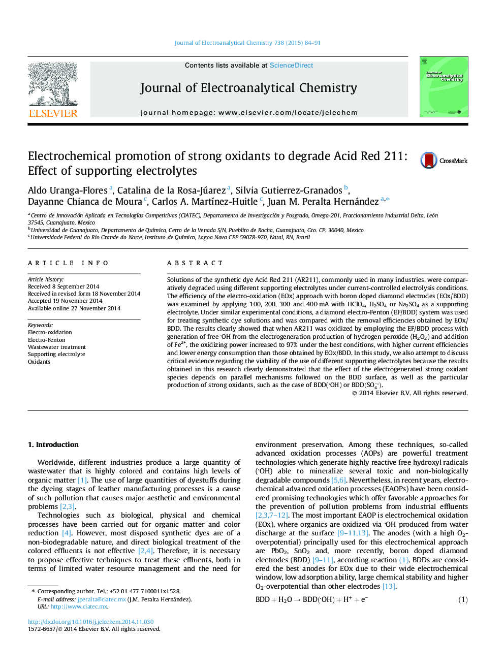 Electrochemical promotion of strong oxidants to degrade Acid Red 211: Effect of supporting electrolytes