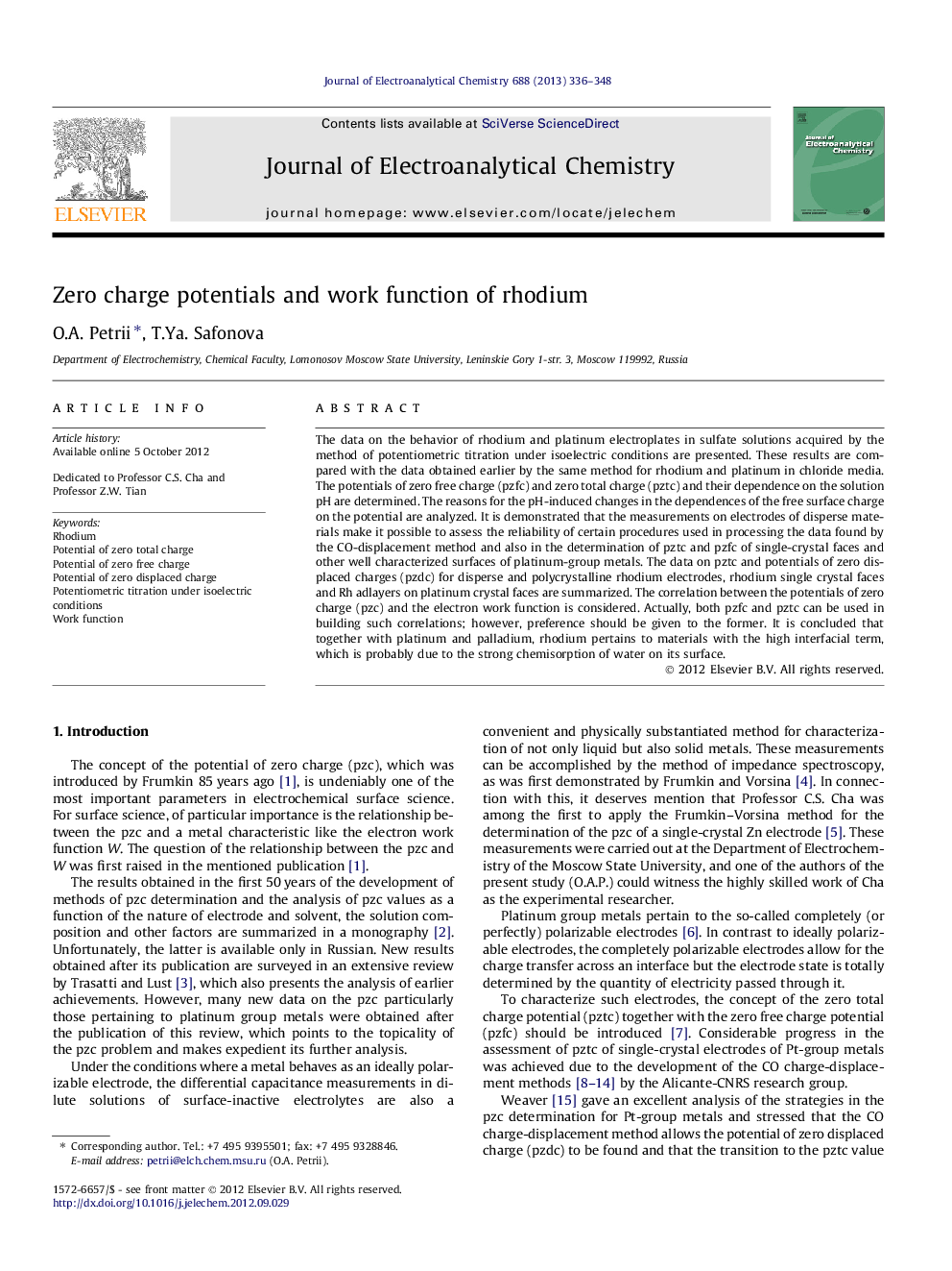 Zero charge potentials and work function of rhodium