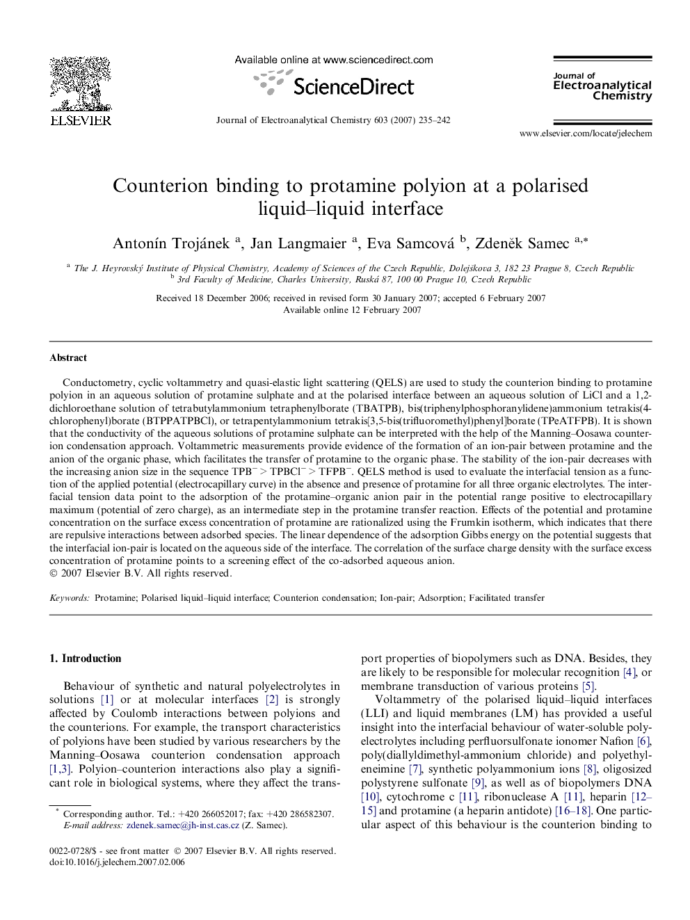 Counterion binding to protamine polyion at a polarised liquid–liquid interface