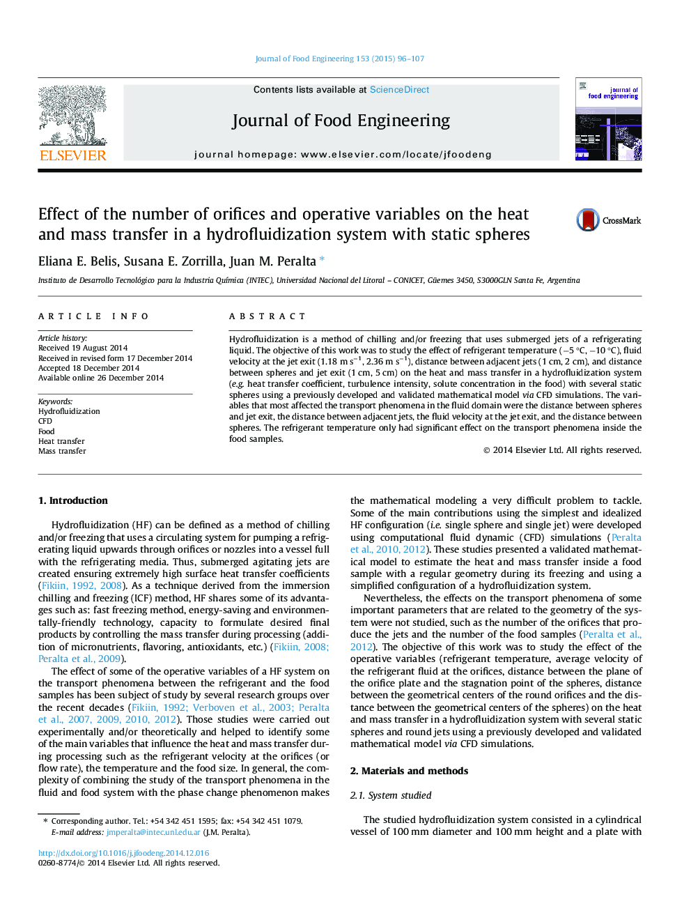 Effect of the number of orifices and operative variables on the heat and mass transfer in a hydrofluidization system with static spheres