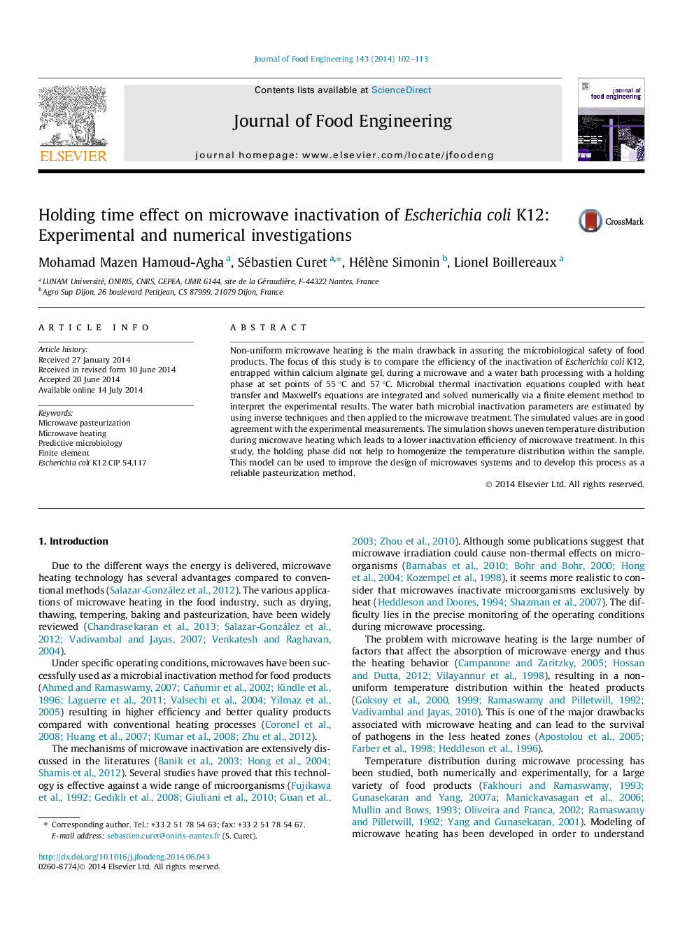 Holding time effect on microwave inactivation of Escherichia coli K12: Experimental and numerical investigations