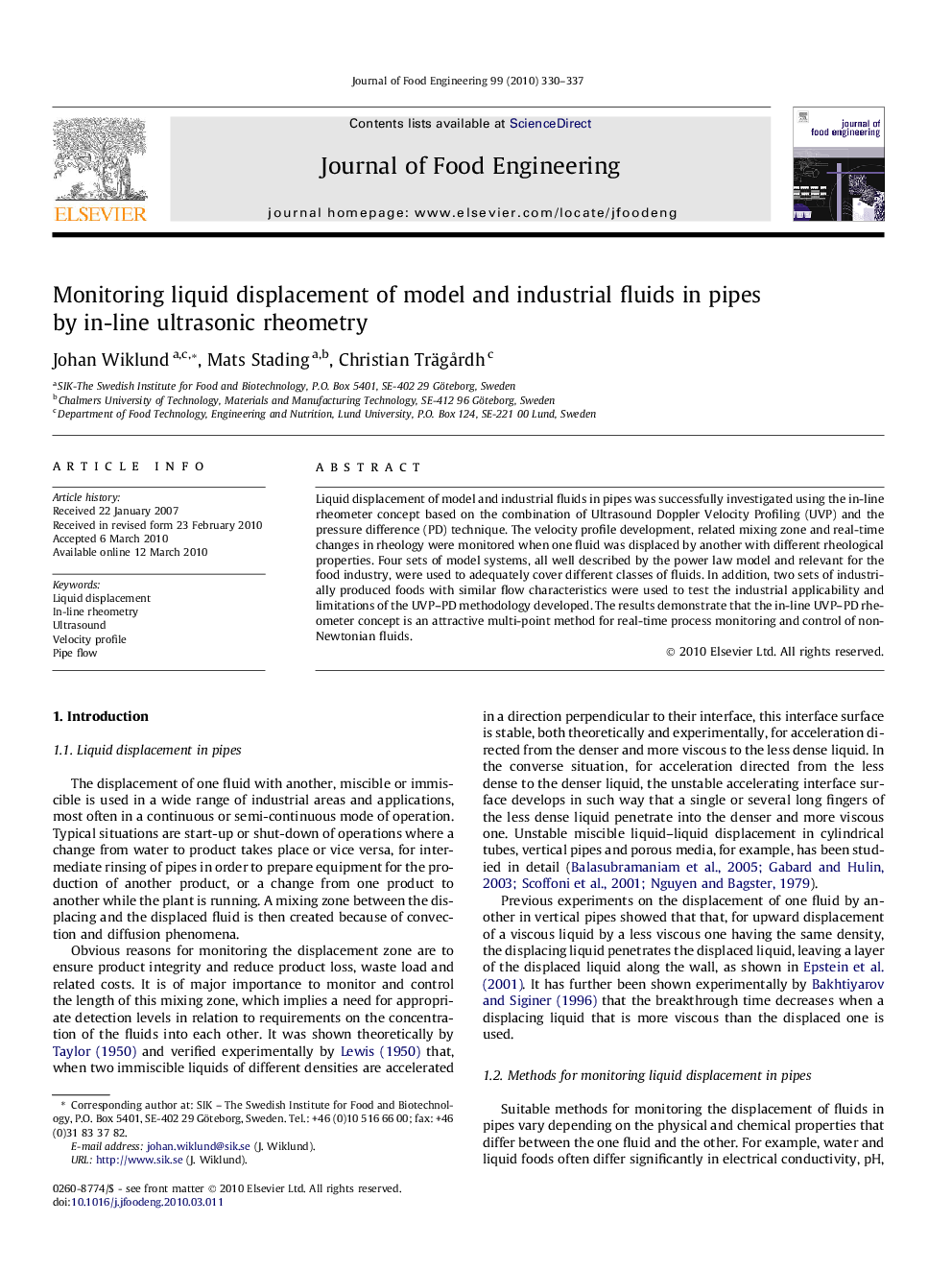 Monitoring liquid displacement of model and industrial fluids in pipes by in-line ultrasonic rheometry