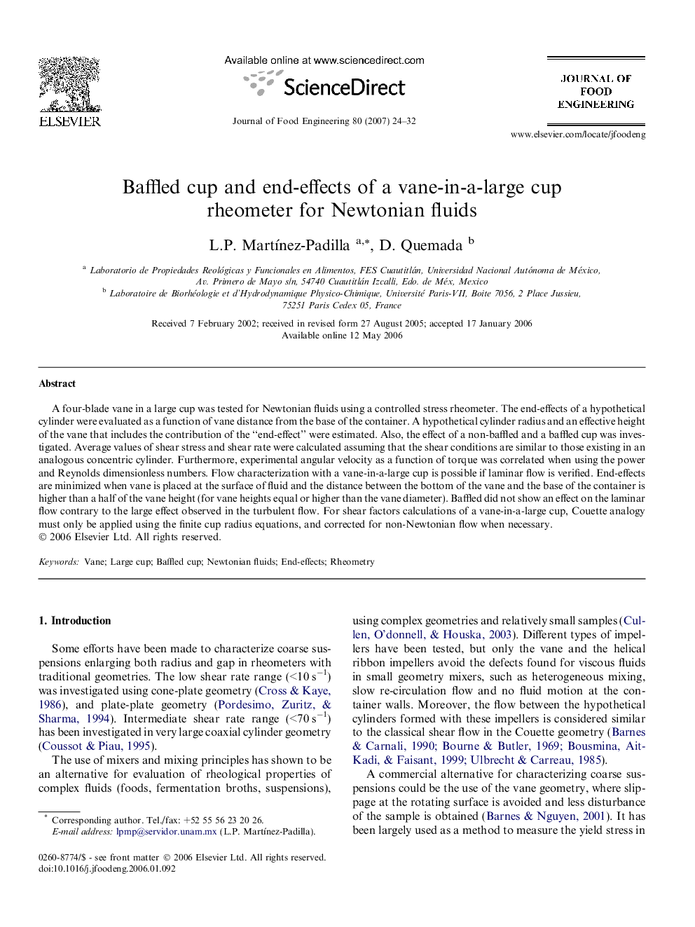 Baffled cup and end-effects of a vane-in-a-large cup rheometer for Newtonian fluids