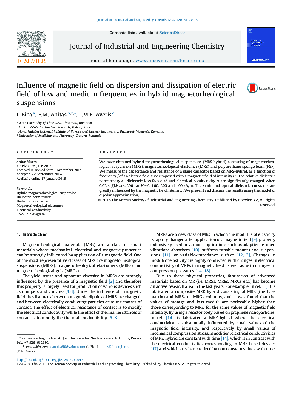 Influence of magnetic field on dispersion and dissipation of electric field of low and medium frequencies in hybrid magnetorheological suspensions